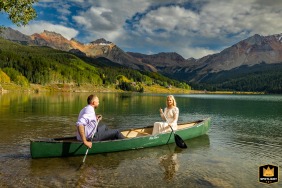 Trout Lake, Telluride, Colorado, is where the happy groom paddles his wife out onto the crystal-clear water for a romantic, peaceful moment following their wedding ceremony.